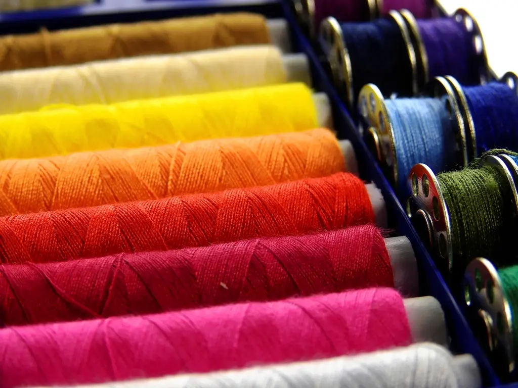 Colorful thread spools wound on paper cores